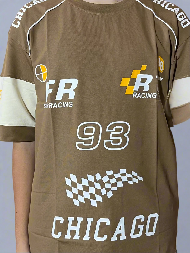Brown racing-themed t-shirt with logos and text on a plain background