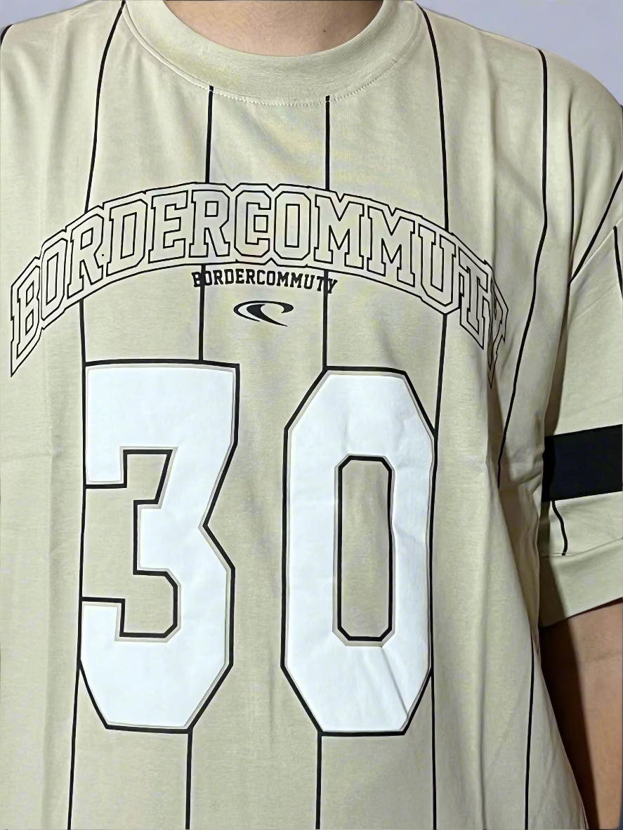 T-shirt with 'Bordercommut' text and number '30' on a beige background