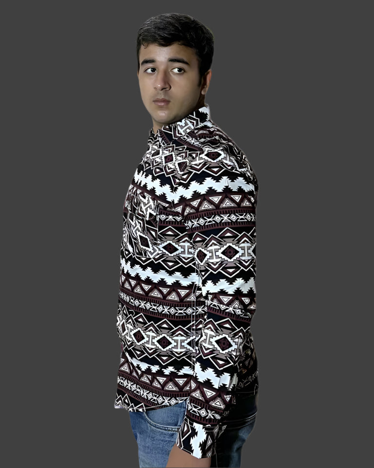 Person wearing a patterned sweater on a white background