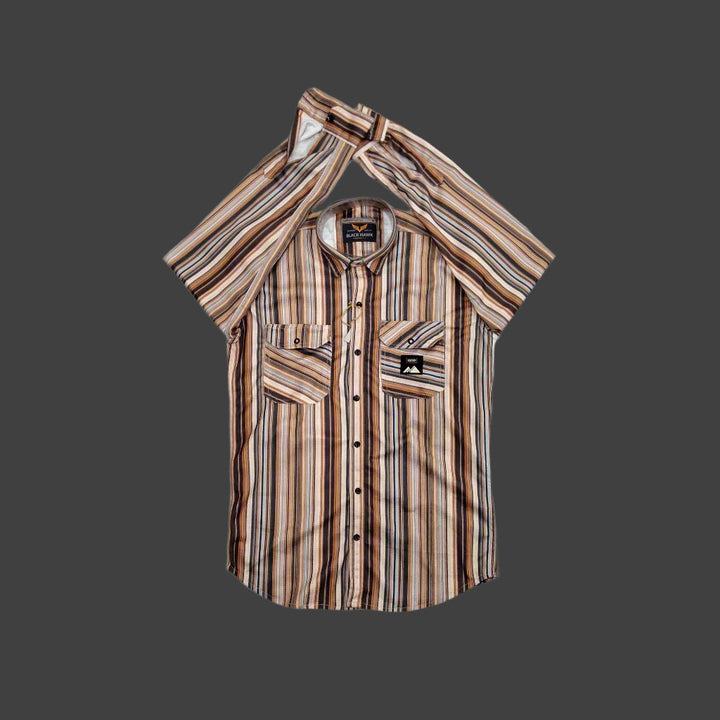 Striped shirt with a brand logo on a dark background